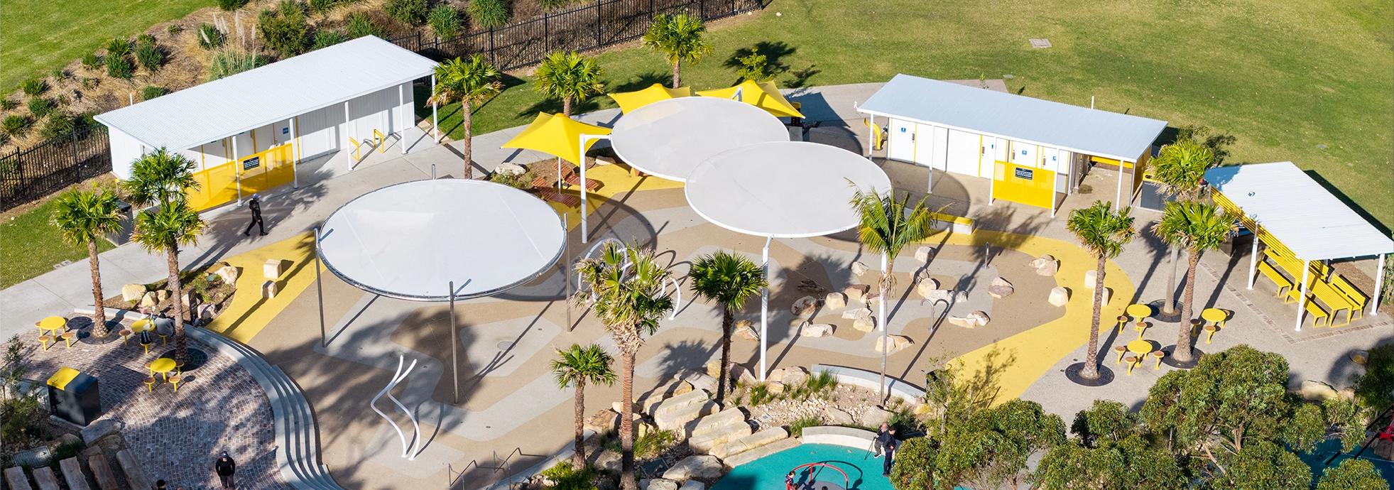 <p style="font-size: 14px; color: #777777; font-style: italic; text-align: center;"><a href="https://www.modusaustralia.com.au/projects/laurie-ferguson-water-playground">Laurie Ferguson Water Playground</a> (Cumberland City Council) - the amenity buildings pick up the splash park's Dover White and Sunshine Yellow palette, reading as part of the precinct rather than a box parked beside it.</p>