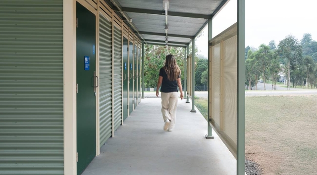 Integrated shelter for queuing and weather protection